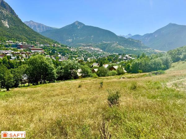 Très grand terrain constructible Briançon expo sud- 5 mn en voiture du centre ville