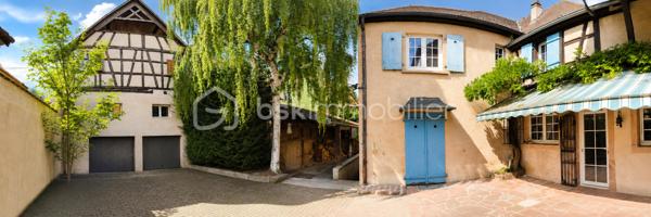 À découvrir à Riquewihr, au cœur de l’un des plus beaux villages d’Alsace !

Situé dans un secteur privilégié, en bordure des fortifications et avec une belle vue sur les vignes, cet ensemble immobilier offre un potentiel particulièrement intéressant et une configuration rare sur le secteur.

Édifié sur une parcelle d’environ 371 m², le bien se compose de deux maisons de village indépendantes, représentant environ :

150 m² pour la première maison
120 m² pour la seconde maison

Soit environ 270 m² habitables au total, avec de nombreuses pièces et possibilités d’aménagement à découvrir.

⭐ Un véritable atout à Riquewihr : garages et stationnements

La propriété dispose de deux garages, ainsi que de plusieurs possibilités de stationnement dans la cour privative.

Un confort particulièrement appréciable et rare à Riquewihr !

L'accès à la propriété est facile tout en bénéficiant d'un emplacement recherché, à proximité du cœur historique du village.

🏠 Un bien aux multiples possibilités

Cette propriété conviendra parfaitement à différents projets :

Grande propriété familiale, résidence principale avec une seconde maison destinée à la location, projet de location saisonnière ou touristique (*Avec accord de la mairie), rapprochement familial, investissement ou encore projet professionnel sous réserve des autorisations nécessaires.

La configuration des deux maisons permet d'imaginer de nombreux projets tout en conservant deux espaces distincts.

Vous découvrirez également une ancienne cave à vin, témoin du caractère et de l'histoire de cette propriété alsacienne.

🔥 Caractéristiques

L'une des maisons est équipée d'un chauffage au fioul, tandis que la seconde dispose d'un chauffage électrique.

Les deux habitations bénéficient également d'un conduit de cheminée, offrant des possibilités d'évolution du mode de chauffage. Un poêle en faïence vient compléter le charme de l'ensemble.

DPE : F. Des travaux sont à prévoir, notamment afin d'améliorer les performances énergétiques du bien.

❤️ Ce que l'on aime

Deux maisons sur une même propriété, environ 270 m² habitables, deux garages, stationnements privatifs, vue sur les vignes, proximité des fortifications et potentiel exceptionnel : une opportunité rare à Riquewihr.

Un bien qui mérite d'être découvert sur place pour apprécier pleinement ses volumes, son caractère et toutes les possibilités qu'il offre.

Prix : 425.000 €

📞06.75.95.64.60 Contactez-moi pour obtenir davantage de renseignements ou organiser une visite.