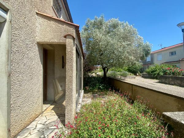 maison avec garage et jardin attenant
