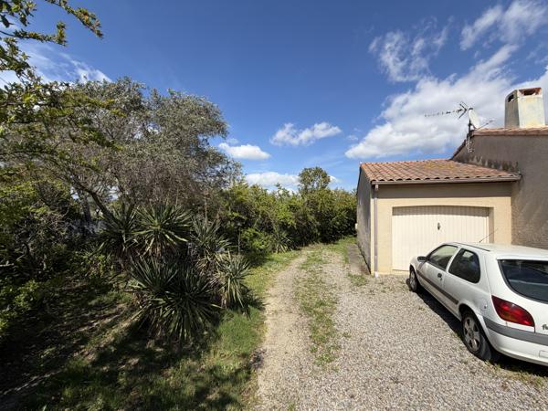 TOUROUZELLE : Maison de plein pied avec garage et terrain sans vis à vis