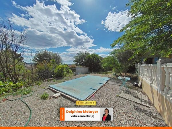 Maison de plain-pied avec piscine et grand terrain arboré