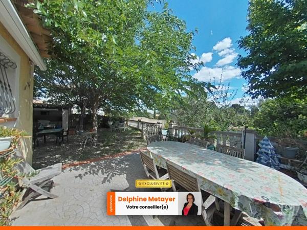 Maison de plain-pied avec piscine et grand terrain arboré