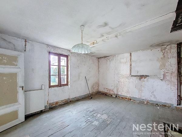 A Vendre Maison en pierre à rénover de 163 m² avec jardin et dépendances proche des commodités