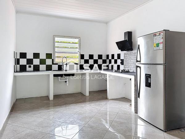 Maison F4 sur grand terrain arboré de 780 m²