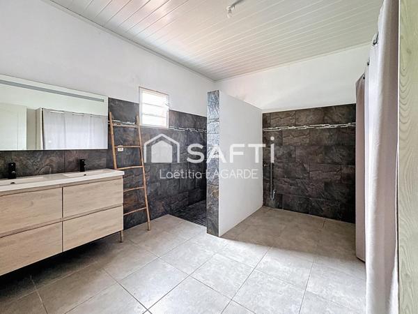 Maison F4 sur grand terrain arboré de 780 m²