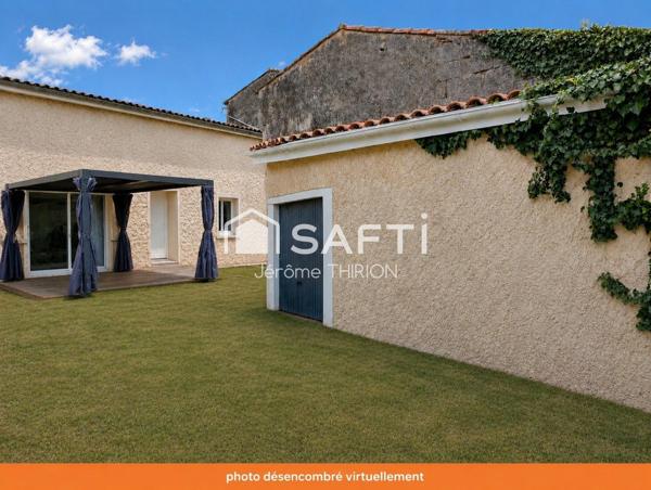 Maison de ville rénovée avec jardin intime au coeur de Saint-Savin