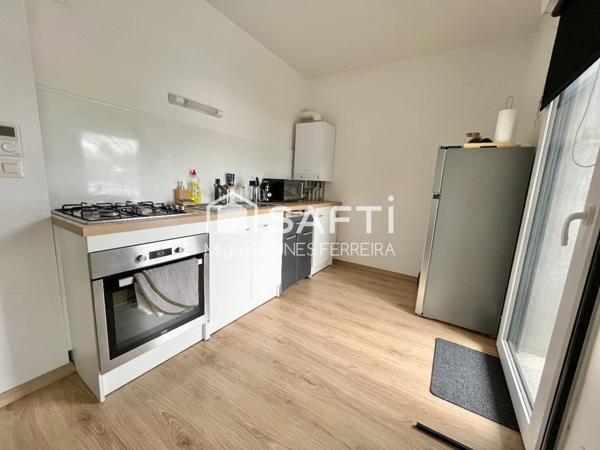 Investissement : Studio loué proche Mairie, avec parking