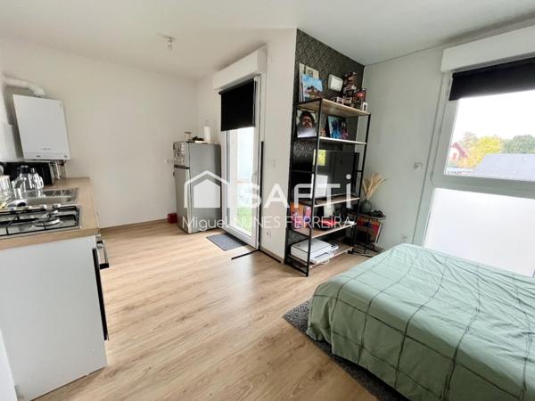 Investissement : Studio loué proche Mairie, avec parking