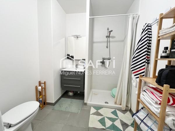 Investissement : Studio loué proche Mairie, avec parking