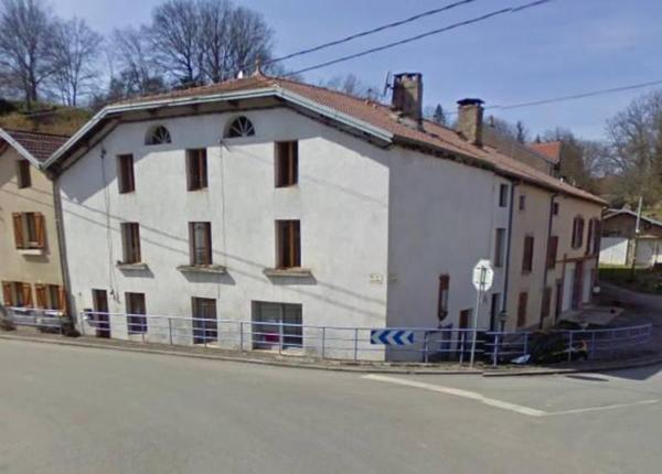 Un immeuble comprenant deux logements, à savoir :