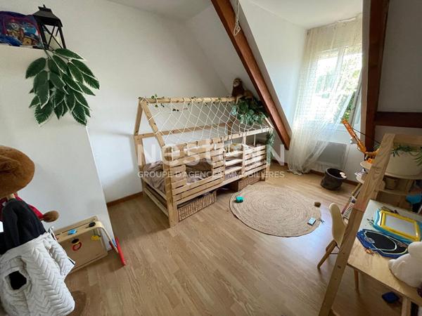 A vendre une maison avec sous-sol total à Morangis de 135 m2 et divisée en 2 appartements