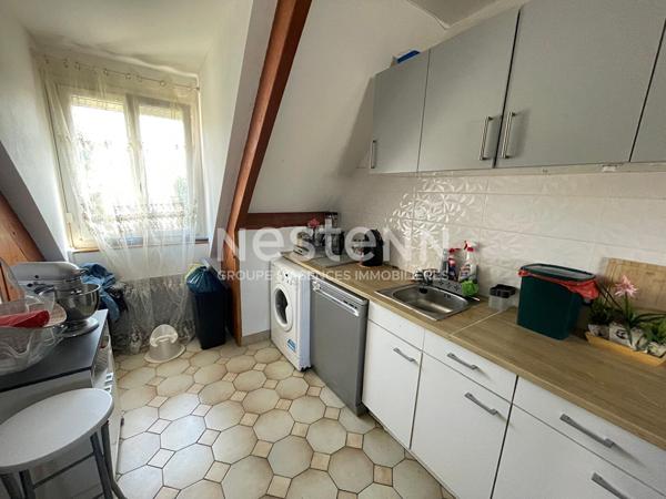 A vendre une maison avec sous-sol total à Morangis de 135 m2 et divisée en 2 appartements