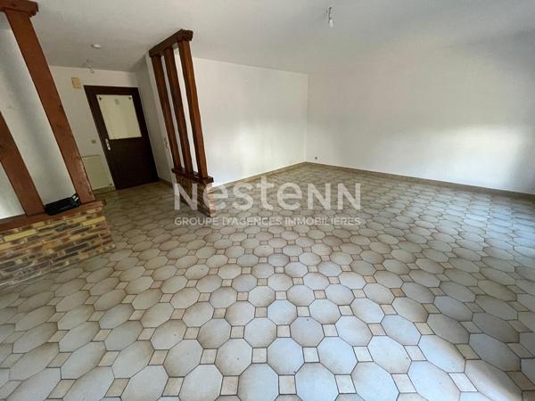 A vendre une maison avec sous-sol total à Morangis de 135 m2 et divisée en 2 appartements