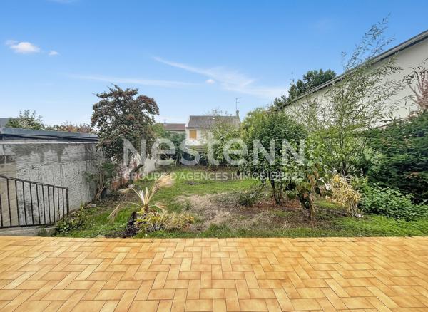 A vendre une maison avec sous-sol total à Morangis de 135 m2 et divisée en 2 appartements