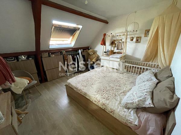 A vendre une maison avec sous-sol total à Morangis de 135 m2 et divisée en 2 appartements