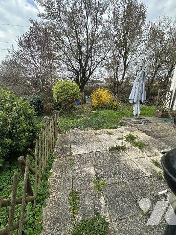 APPARTEMENT REZ DE JARDIN avec GARAGE