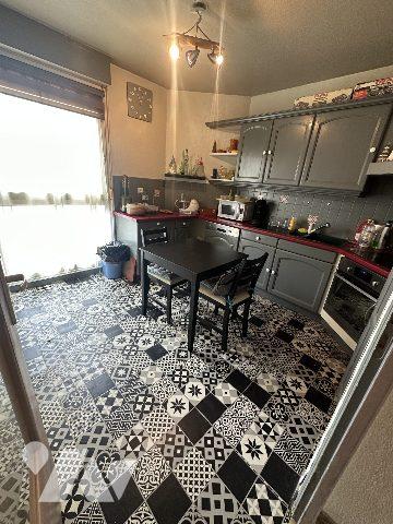 APPARTEMENT REZ DE JARDIN avec GARAGE