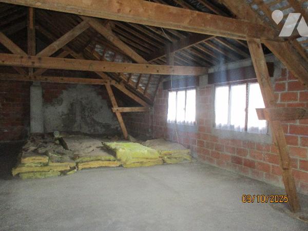 A HAM Maison à usage d'habitation  sur sous sol 
Grenier aménageable
Cour 
Garage