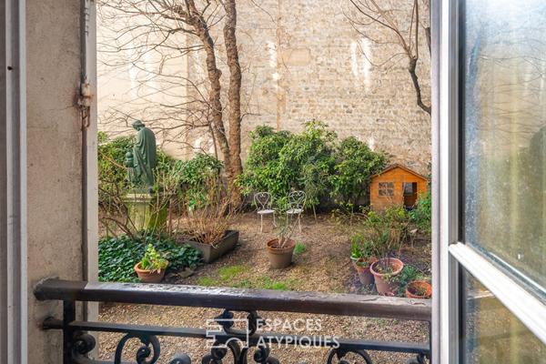 Rez-de-chaussée à réinventer sur jardin au calme d’une impasse