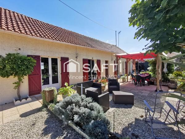 Maison T6 de 132m² avec jardin et garage.