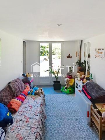 Maison T6 de 132m² avec jardin et garage.