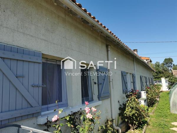 Maison T6 de 132m² avec jardin et garage.