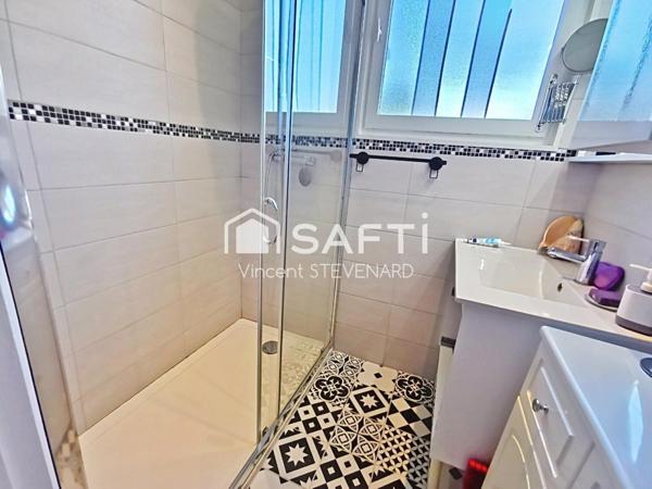 Maison T6 de 132m² avec jardin et garage.