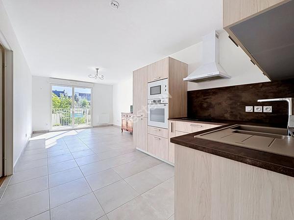 Appartement - Copropriété récente - Balcon - jardin commun