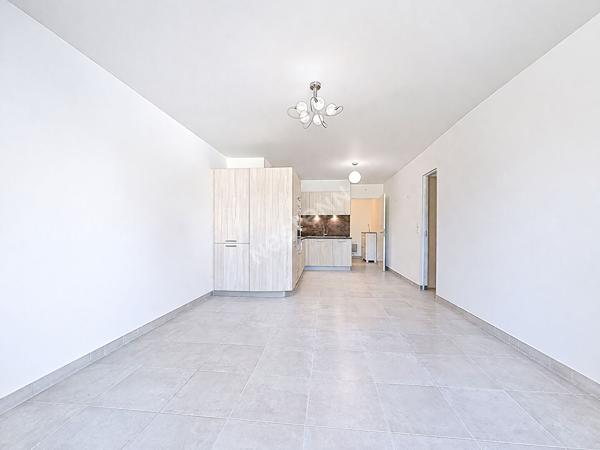 Appartement - Copropriété récente - Balcon - jardin commun