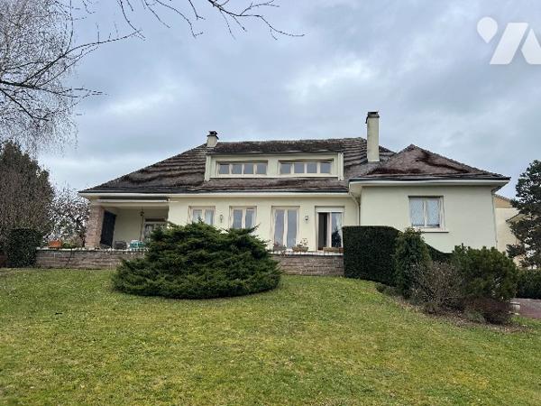 Maison d'habitation sur beau parc arboré