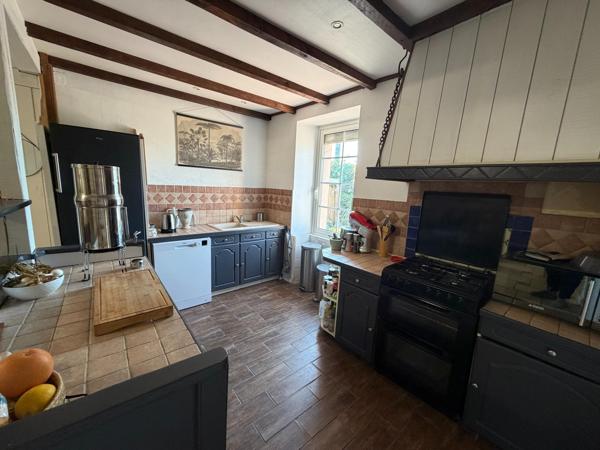 Jolie maison de 165 m2 5 pièces 3 chambres sur jardin de plus de 1000 m2
