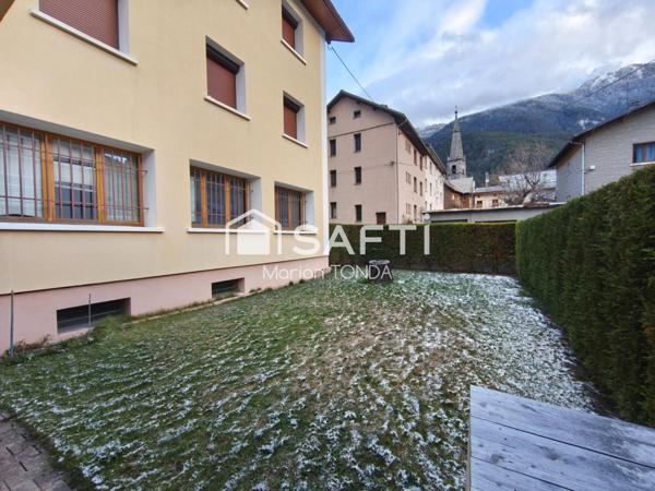 Appartement avec garage et jardin privé
