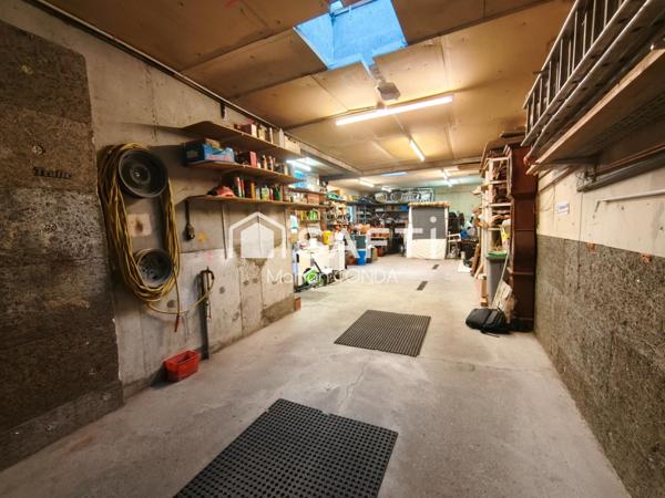 Appartement avec garage et jardin privé