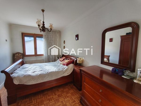 Appartement avec garage et jardin privé