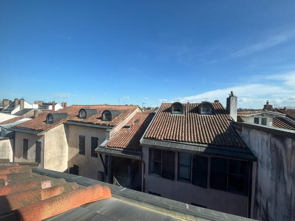 Magnifique T4 en duplex hyper centre ville