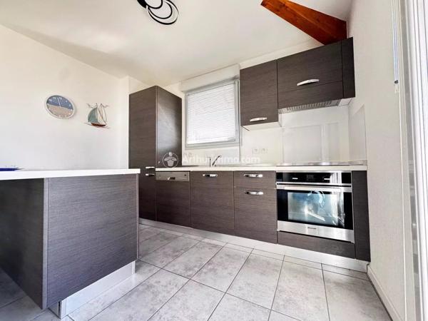Vente                                                      Appartement
                        
                     4 pièces                      75 m2                     à Évian-les-Bains