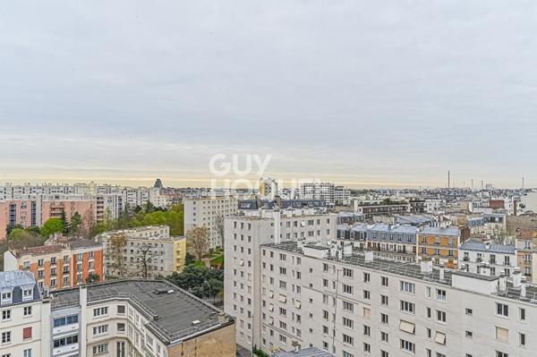 Trois pièces en étage très élevé - Vue dégagée - Lumineux et paisible