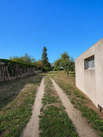 TERRAIN CONSTRUCTIBLE 497 m² - avec GARAGE - CENTRE À 350 m