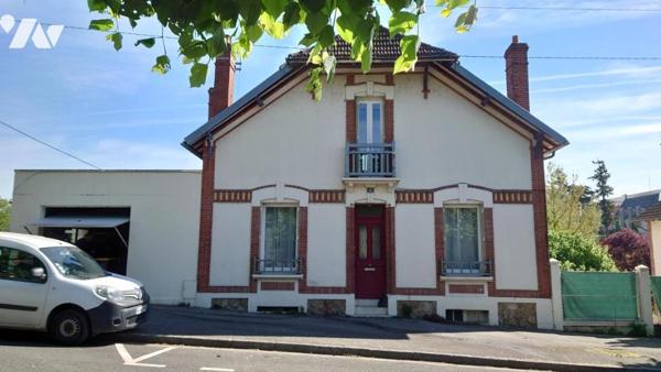 MAISON DE VILLE AVEC JARDIN 
