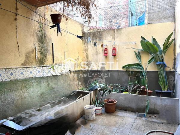 Maison de village avec garage et une cour de 20m² !