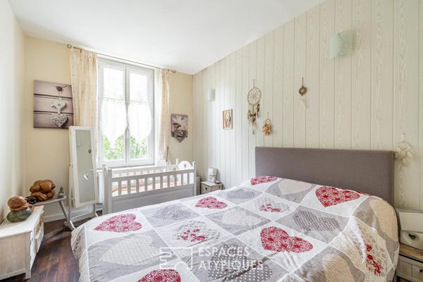 Rez-de-jardin avec terrasse et caves