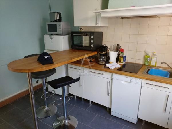 Proximité centre ville Dieppe .Immeuble de 3 Logements Meublé et un garage loué à l'année