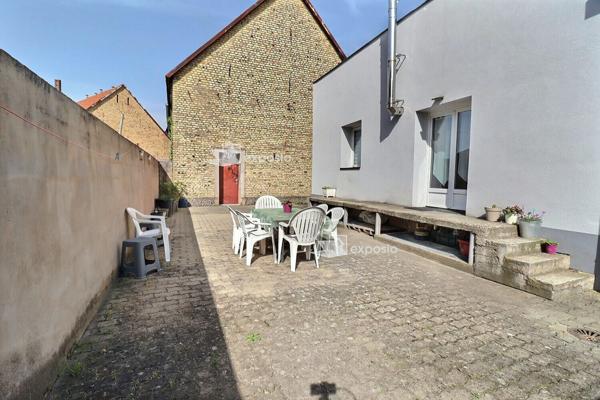 Appartement au centre de GERSTHEIM un 6 pièce(s) 131 m2 plus cour privative de280m2