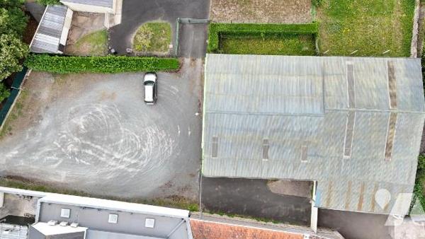 Local commercial avec parking en zone constructible 