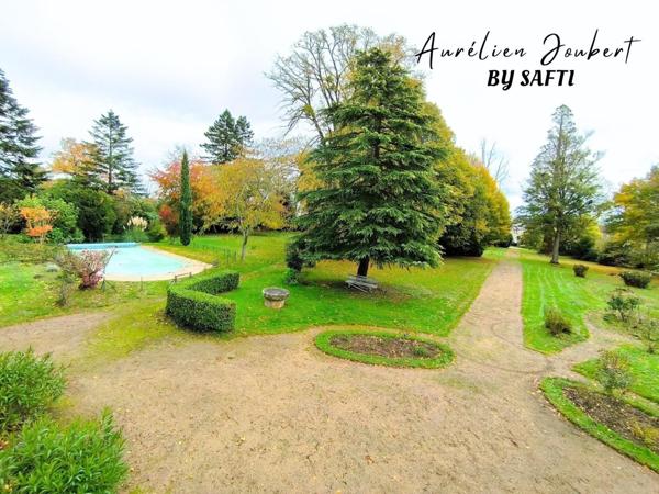 Propriété de caractère dans un écrin de verdure