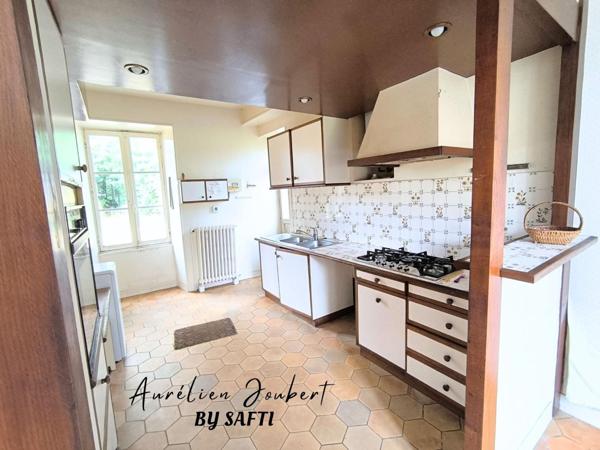 Propriété de caractère dans un écrin de verdure