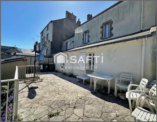 Maison à rénover en plein centre avec jardin
