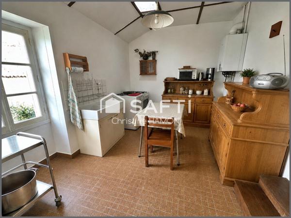 Maison à rénover en plein centre avec jardin