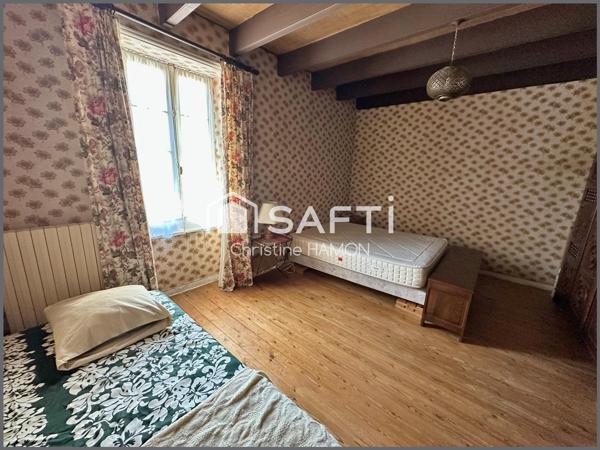 Maison à rénover en plein centre avec jardin