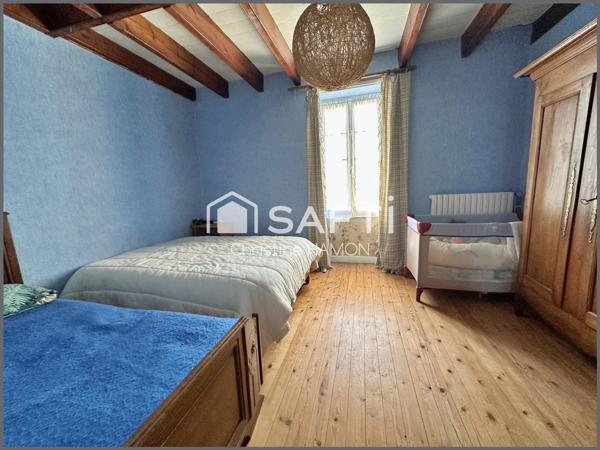 Maison à rénover en plein centre avec jardin